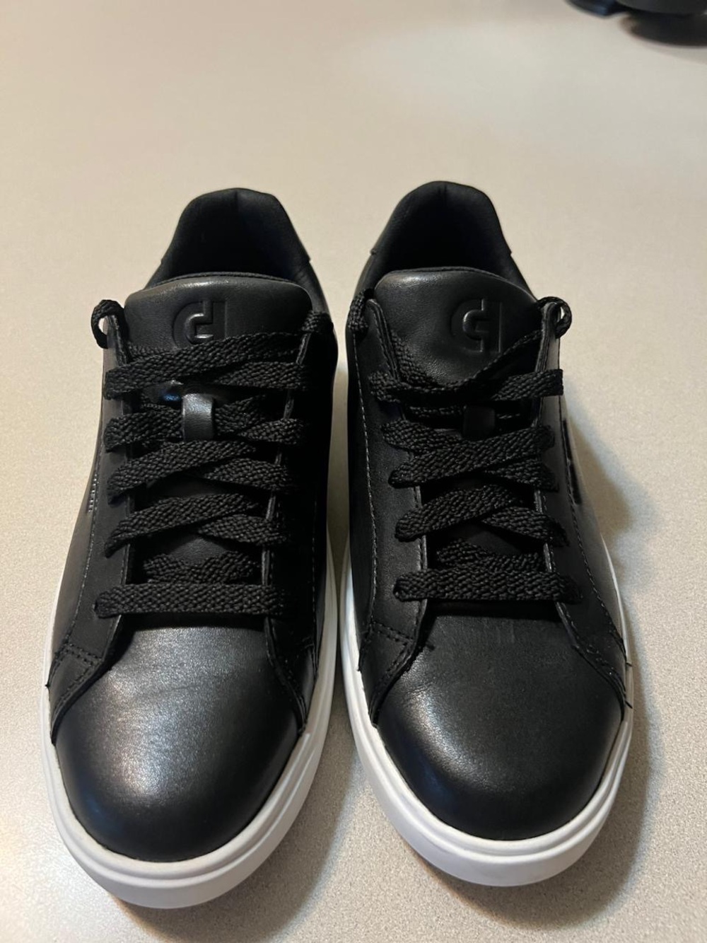 Cole Haan Black Leather Low-Top Sneakers with White Sole